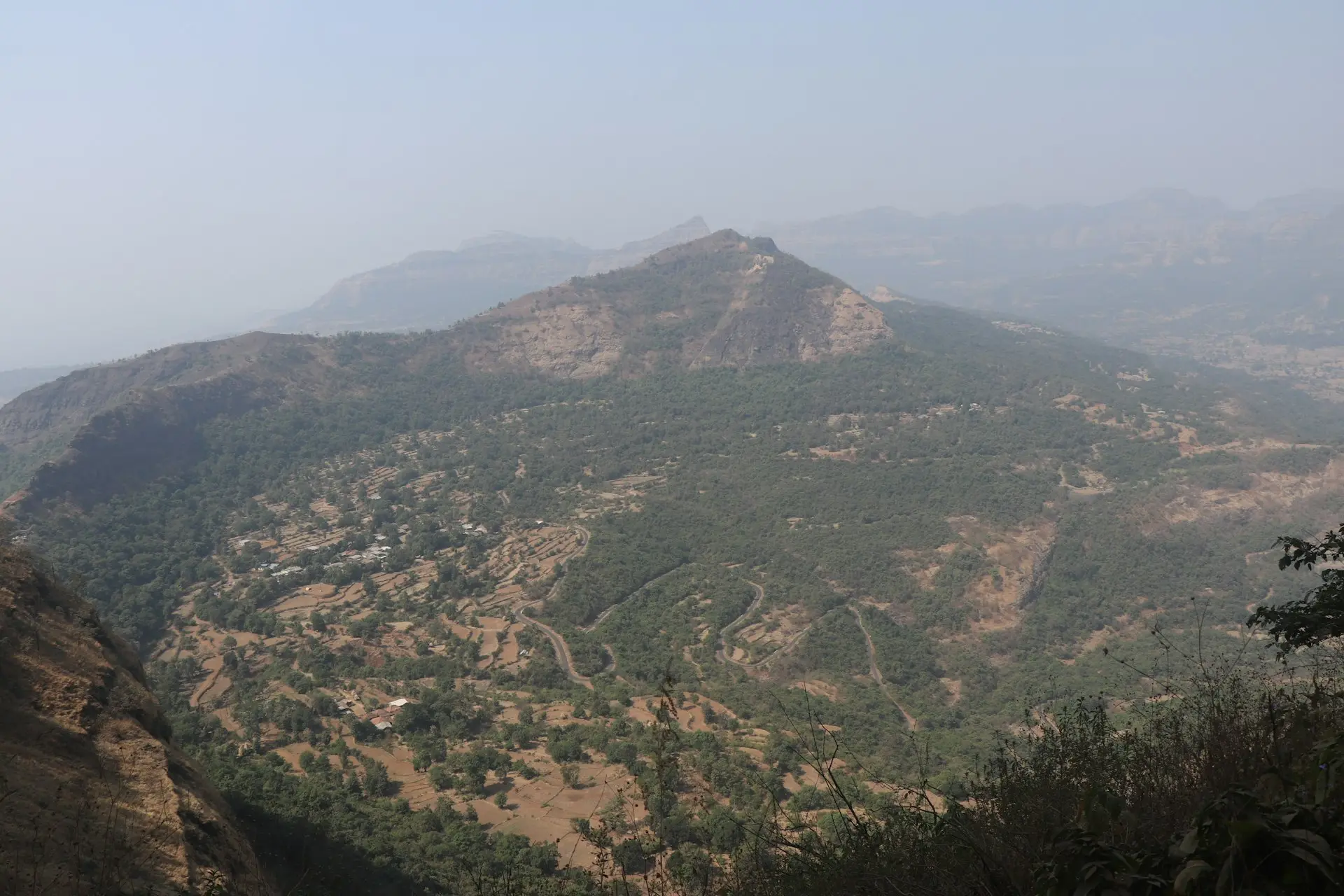 green and brown mountains under blue sky during daytime