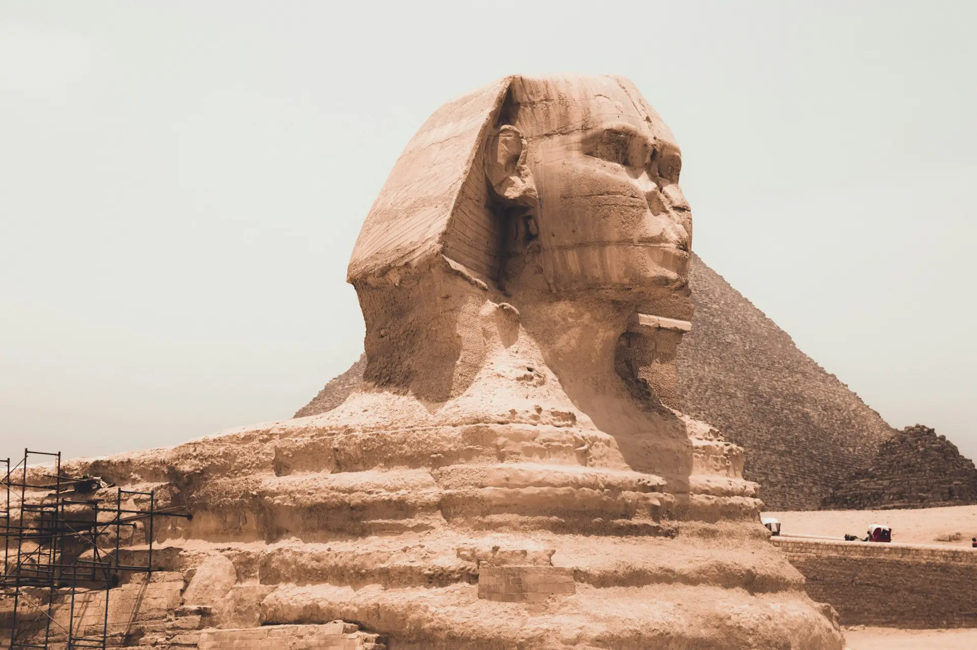 Egypt pyramids and desert landscape at sunset
