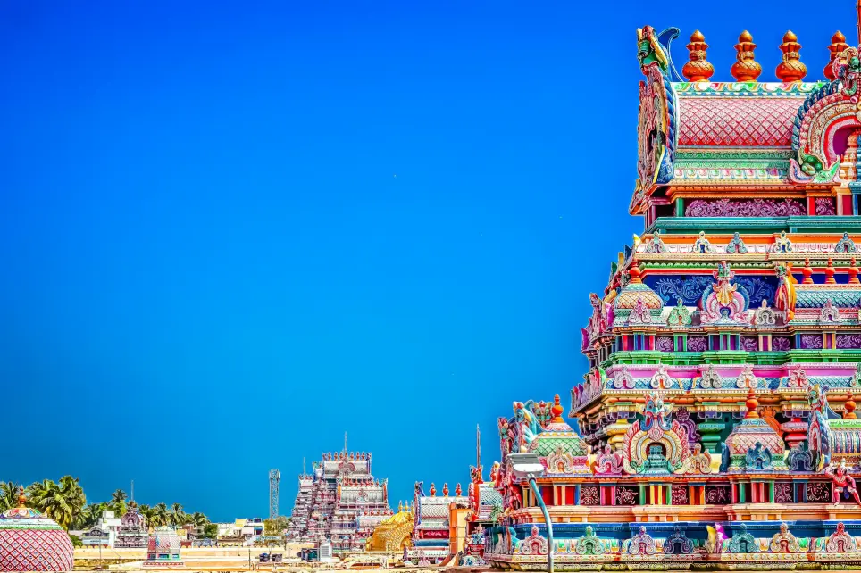 a very colorful building with a blue sky in the background