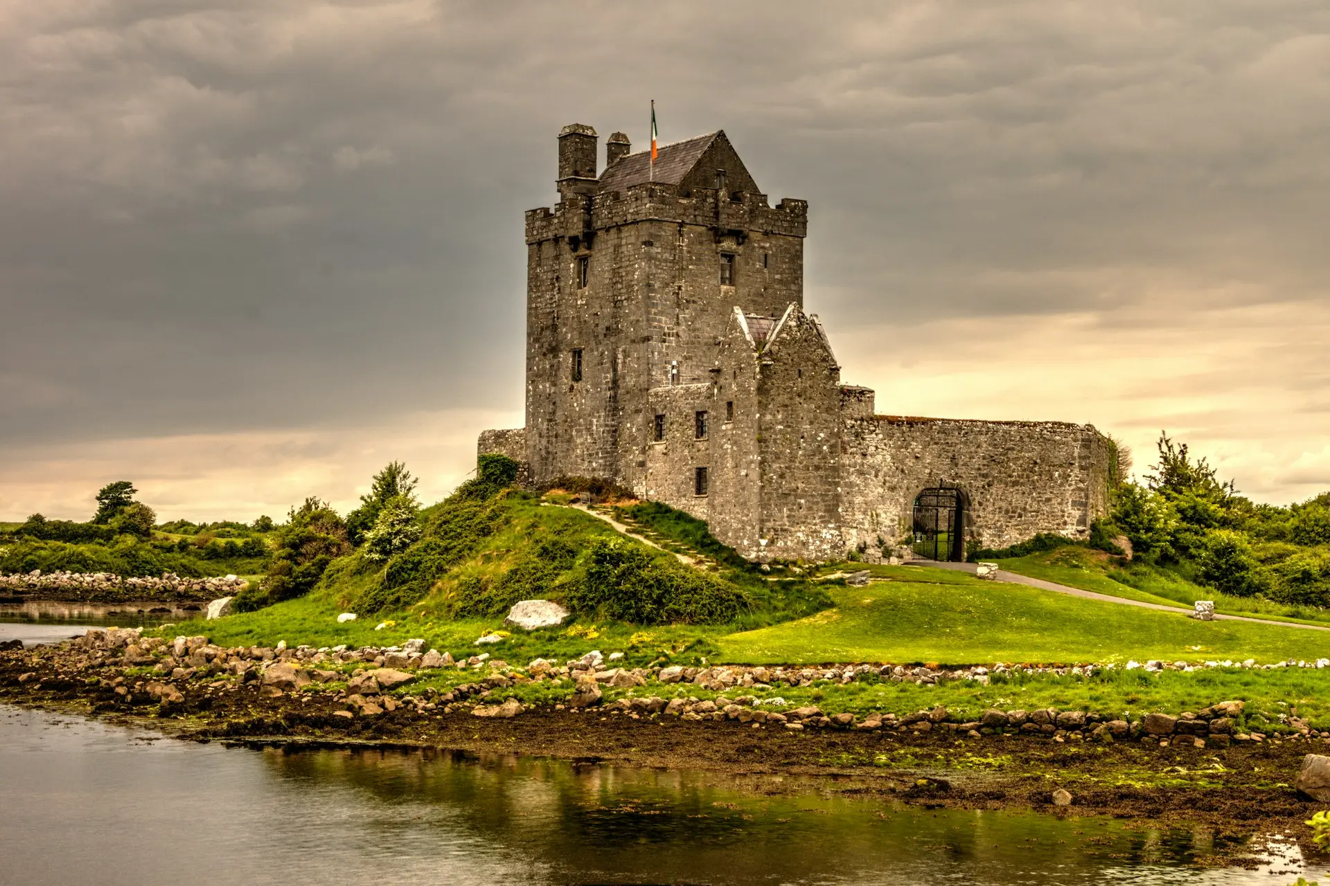 view photography of gray castle on island