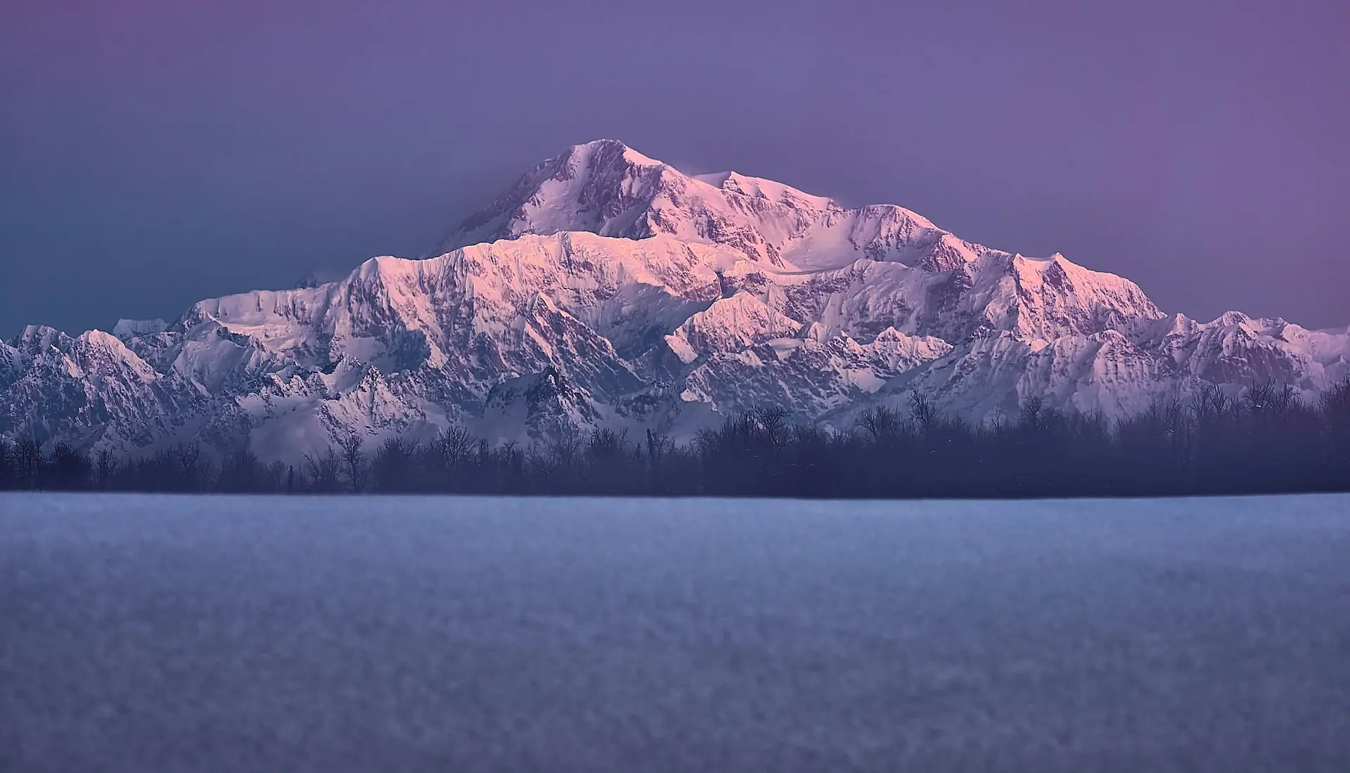 snow covered mountain during daytime