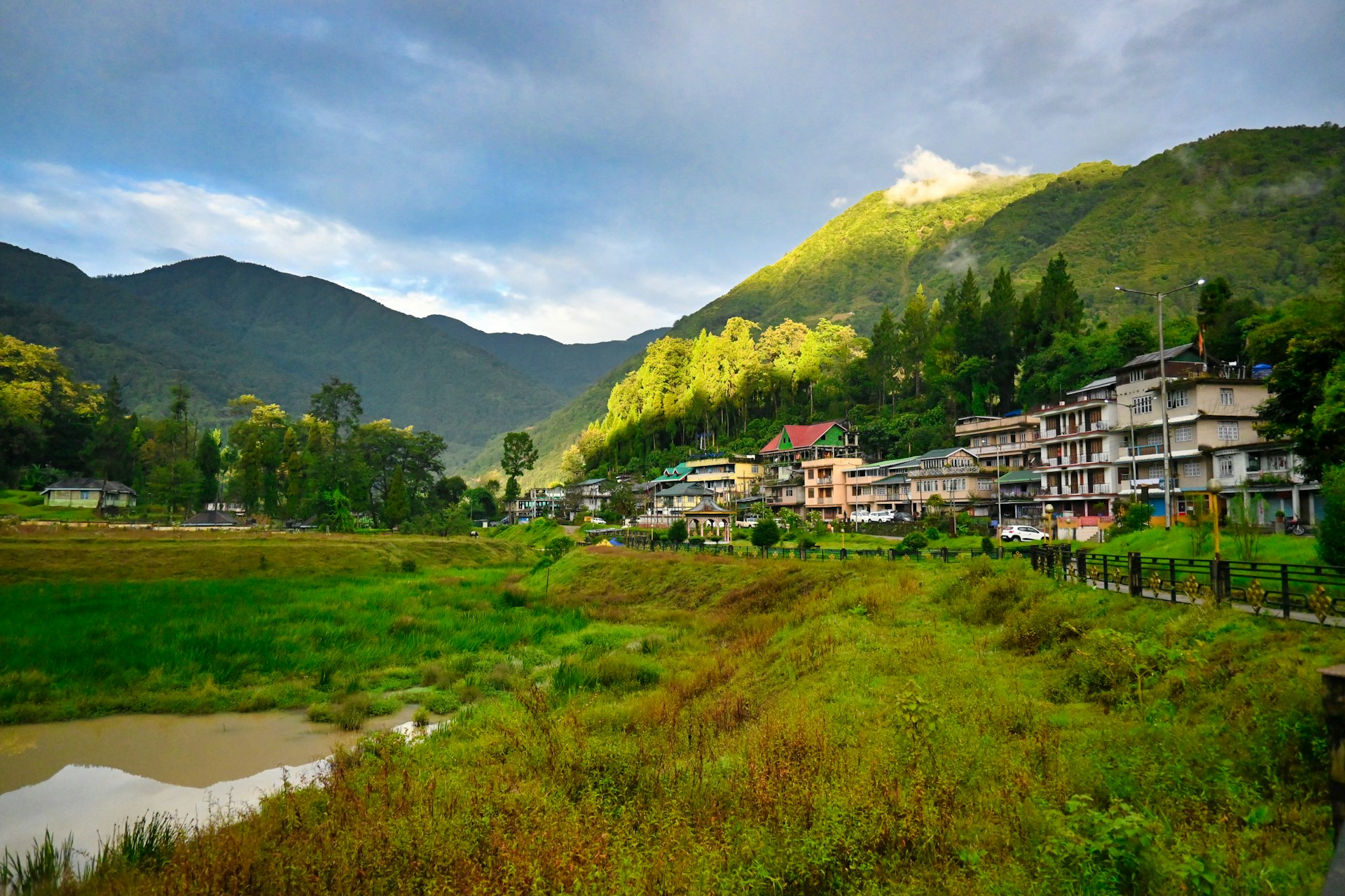 Scenic Karnataka hill station tour from Bangalore by Galaxy International Tours featuring waterfalls and lush greenery