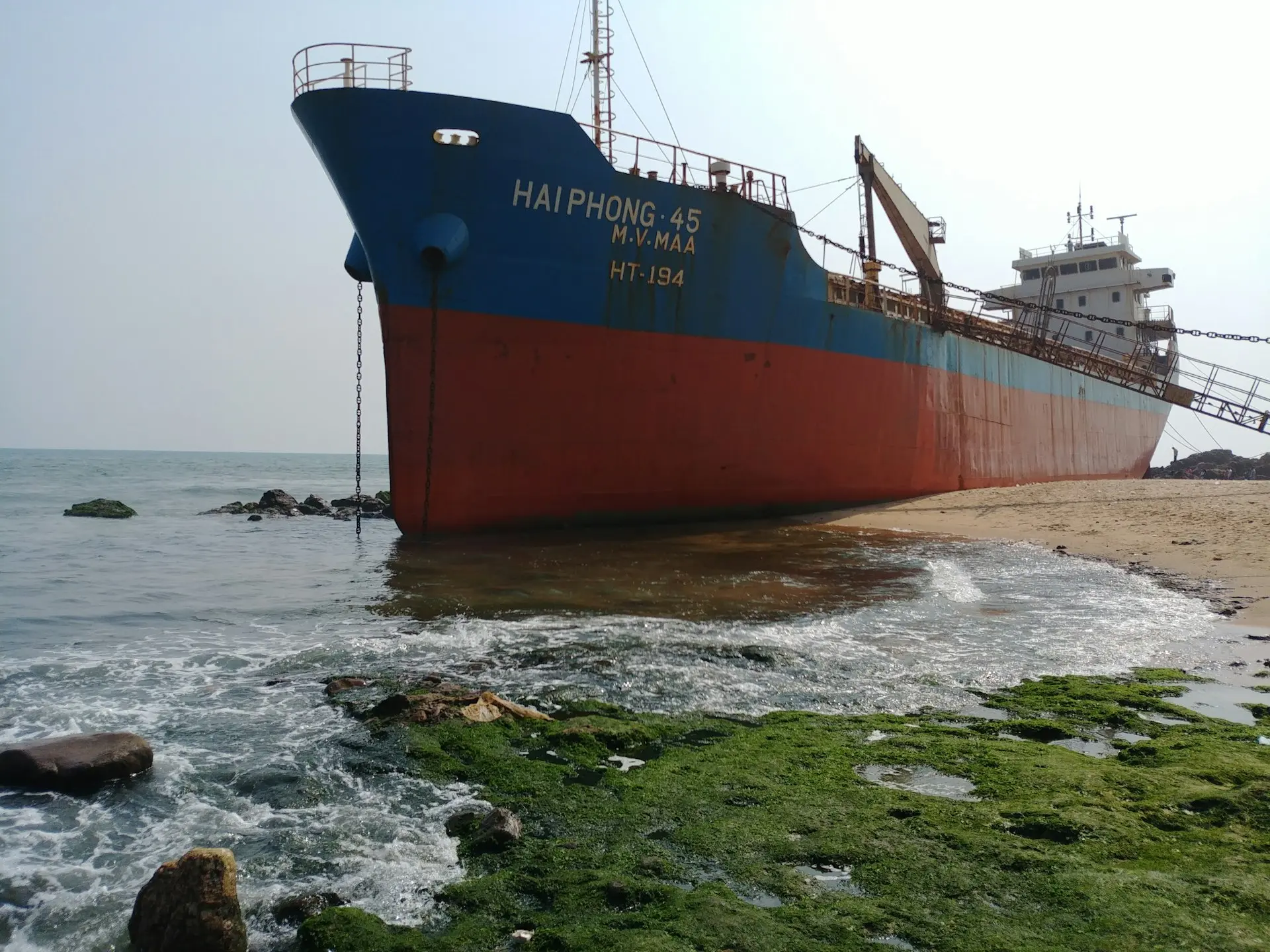 a large ship sitting on top of a body of water