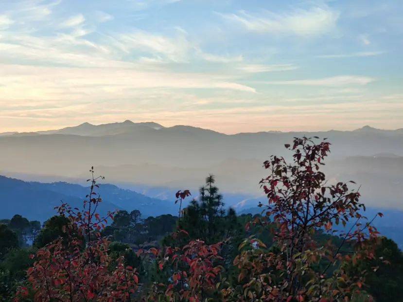 Peaceful hill station view of Nainital and Raniketh hills at sunset – part of Galaxy International Tours’ holiday tour package