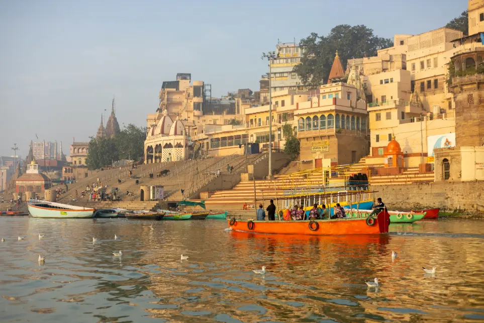 a group of boats floating on top of a river